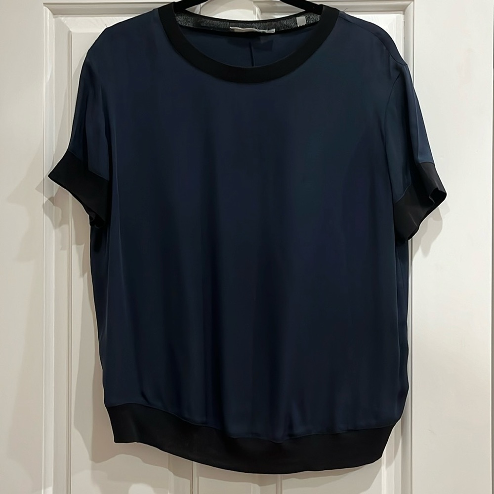 Vince silk short sleeve shirt with black trim on collar and sleeves. Size small.